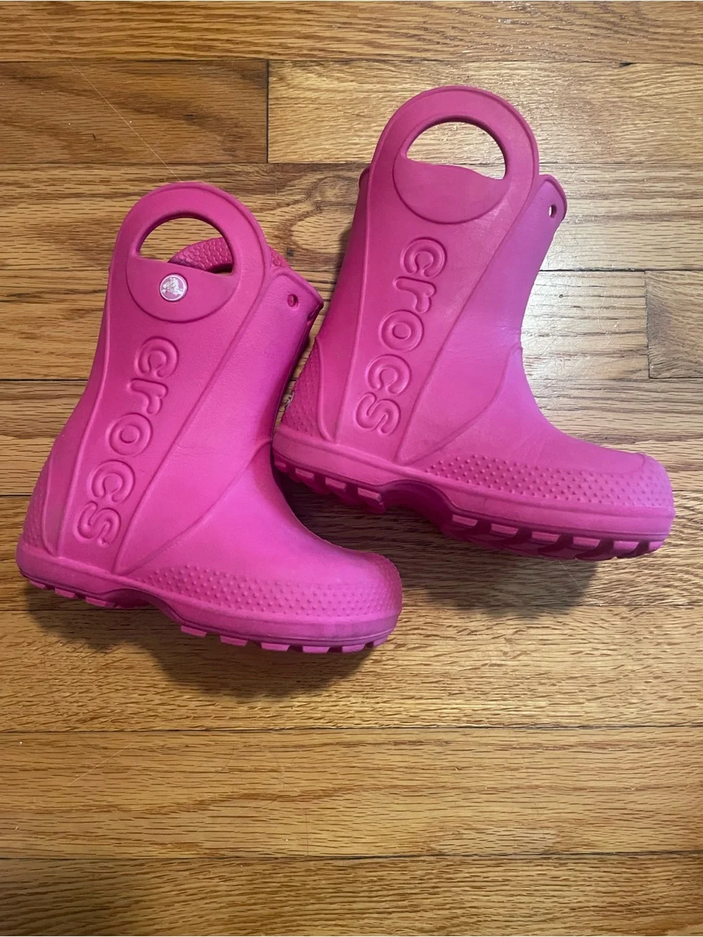 CROCS Kids Waterproof Handle Rain Boot in Bright Pink